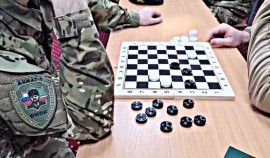 В ОМОН «АХМАТ-1» прошел турнир по шашкам, приуроченный к юбилейным датам Росгвардии| грозный, чгтрк